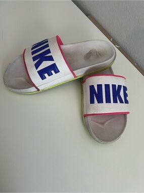 Nike White Slide Sandals with Blue Logo and Pink Trim